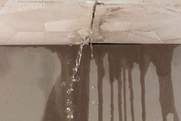 Professional Flood Damage Cleanup technician working in Phippsburg, ME
